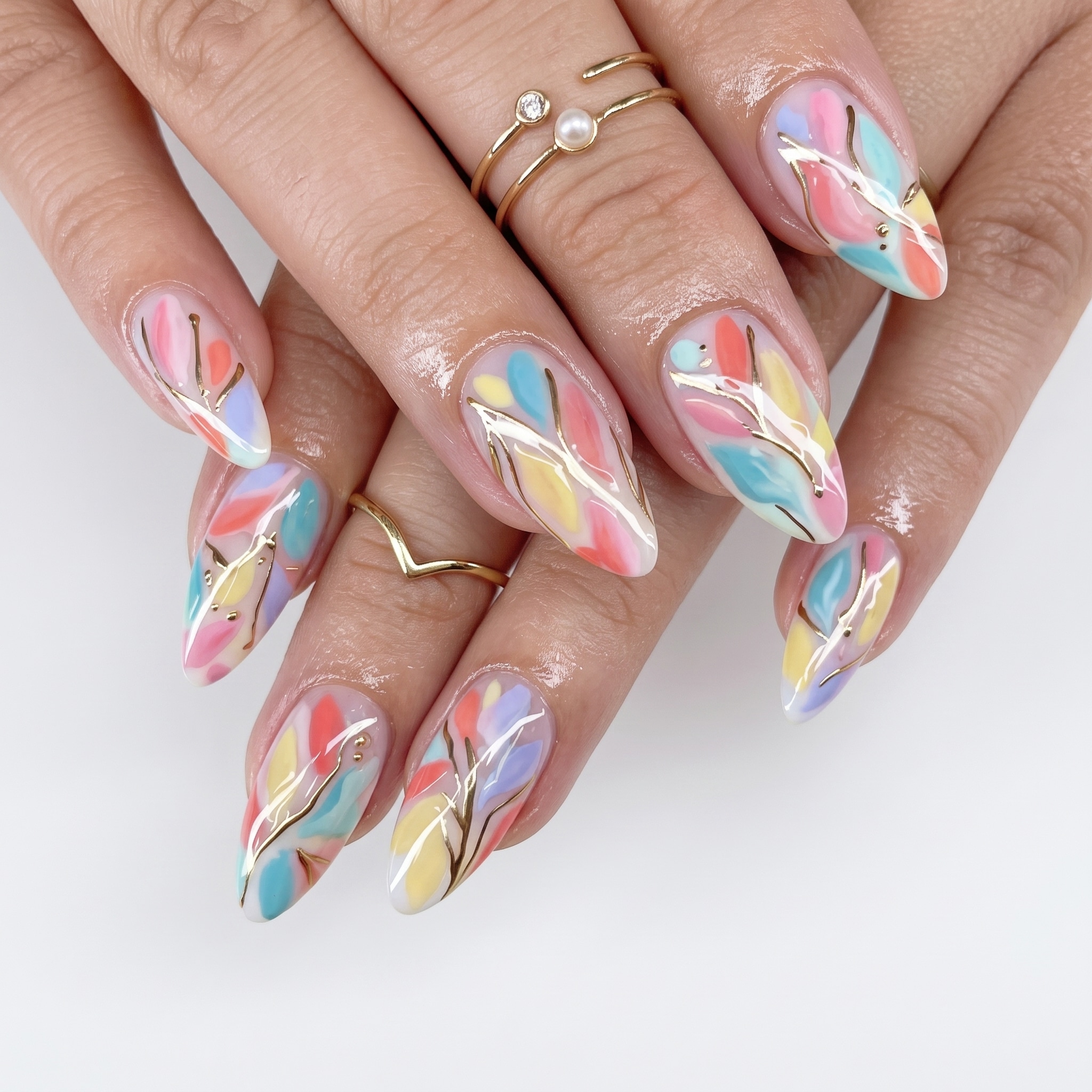 Colorful abstract almond nail designs with glossy manicure art