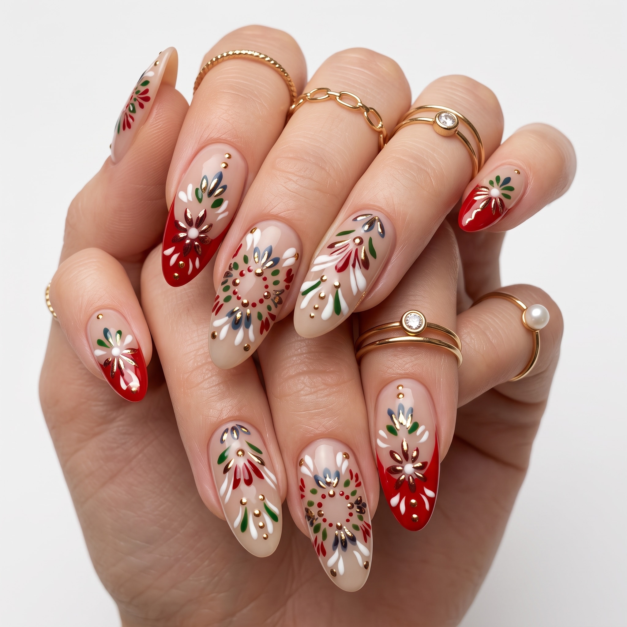 Seasonal and holiday nail designs with red white floral and festive manicure details