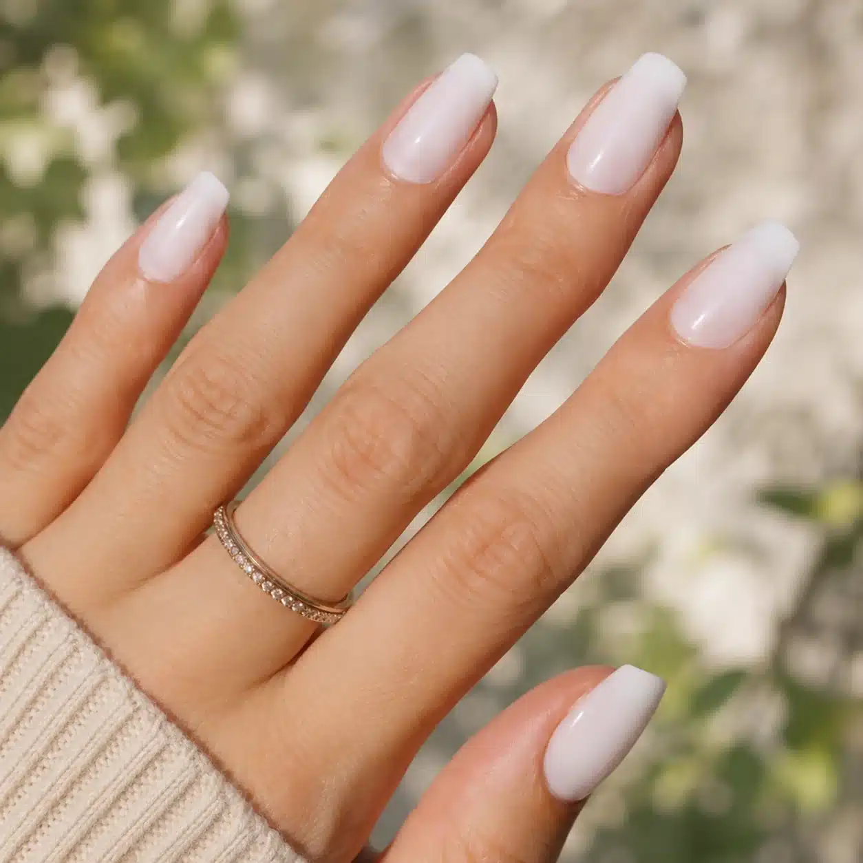 Milky White Coffin Nails: 7 Clean, Sculpted Looks 3 Soft white coffin nails in natural light
