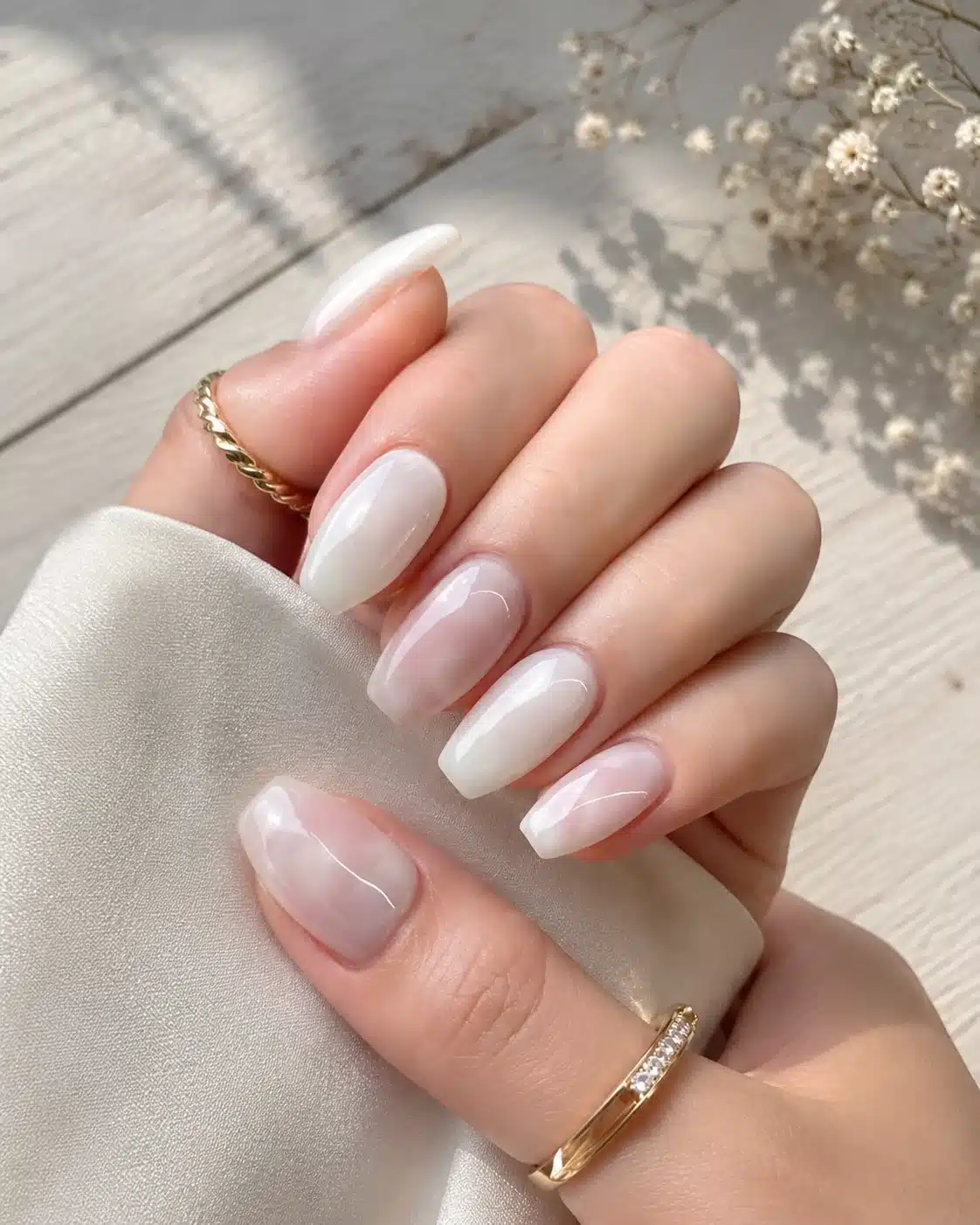 Milky White Coffin Nails: 7 Clean, Sculpted Looks 7 Soft square coffin nails with milky French details