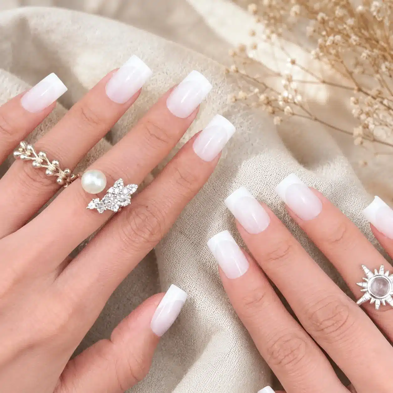 Milky White Coffin Nails: 7 Clean, Sculpted Looks 8 Milky white coffin nails with delicate design accents
