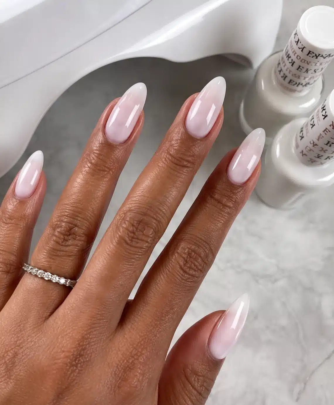 Glazed milky pink almond nails
