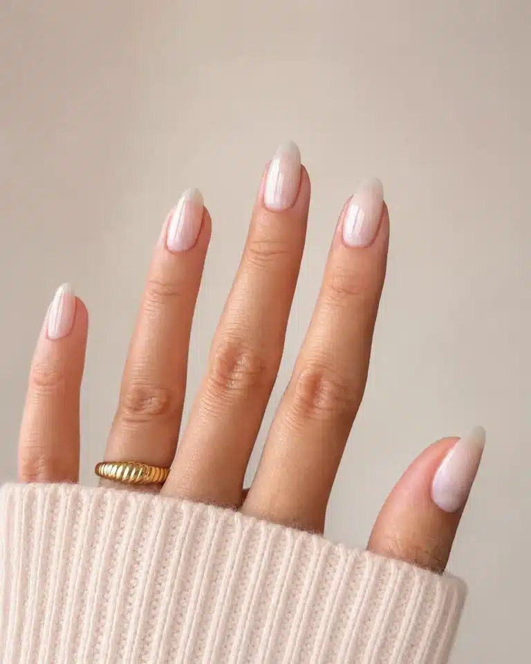 Milky White Acrylic Nails: 10 Ideas for Every Manicure Vibe 11 Milky white acrylic nails in a simple almond shape