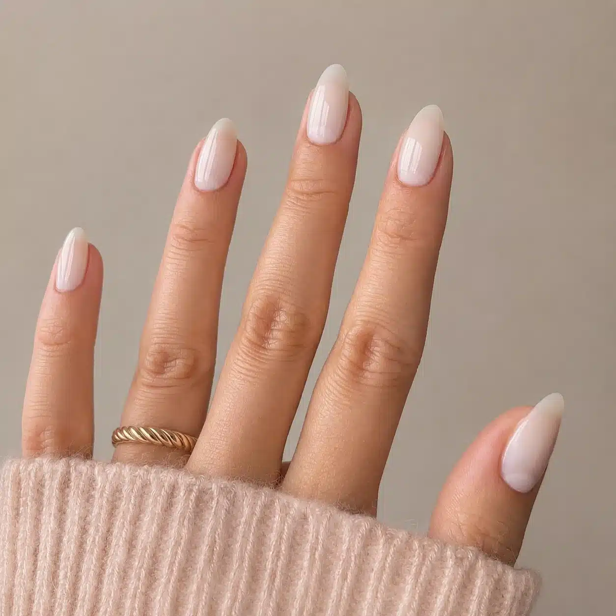 Milky White Almond Nails: 9 Clean-Girl Looks 1 Milky white almond nails with a clean glossy finish