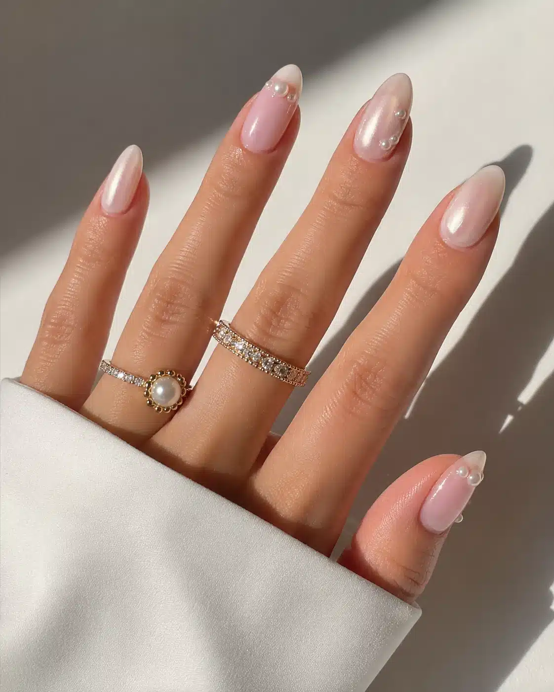 Milky White Chrome Nails: Pearl, Glazed & Soft White Ideas 7 Clean almond milky white chrome nails with glossy top coat