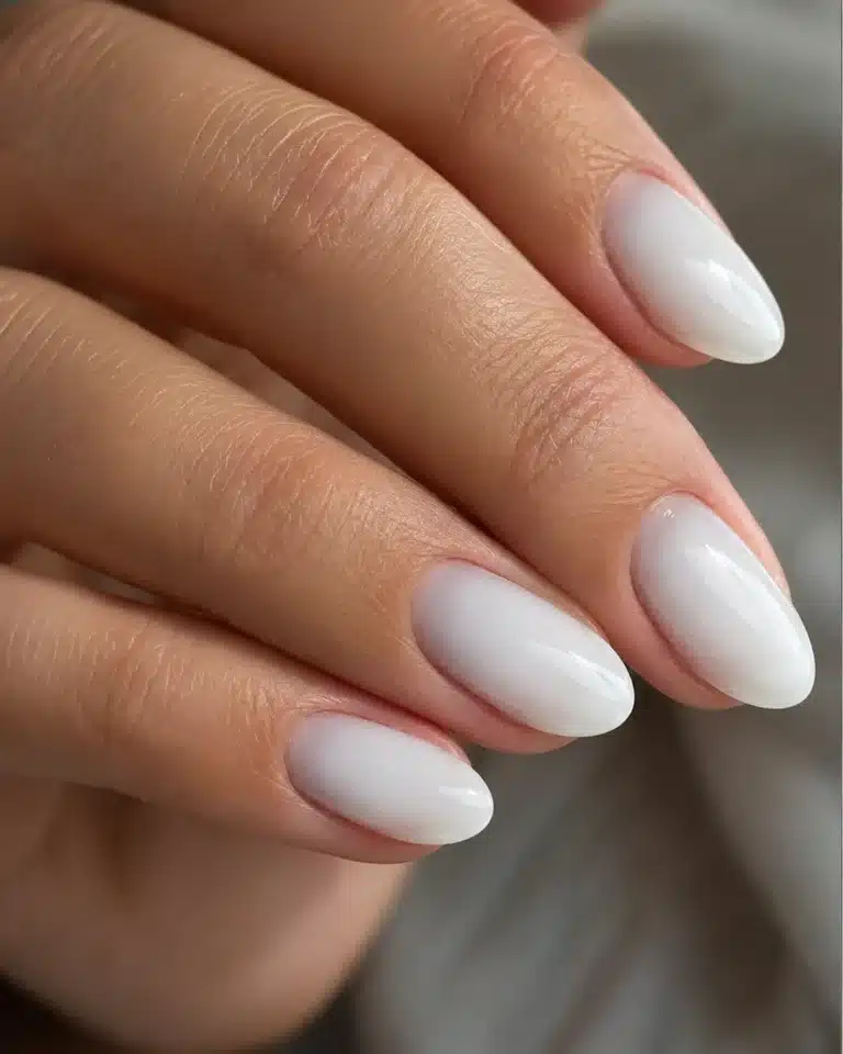 Milky White Chrome Nails: Pearl, Glazed & Soft White Ideas 11 Milky white chrome nails with a glossy pearly finish