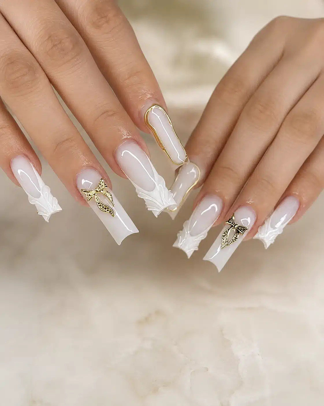 Milky White Nails With Design: Chrome, Flowers, Gold & Almond Ideas 3 Milky white nails with 3D white and gold design accents
