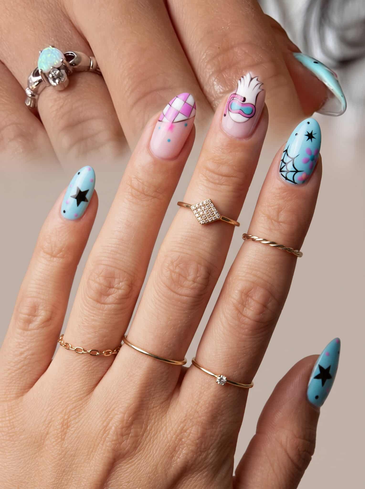 blue purple ghost summer manicure with soft spooky details