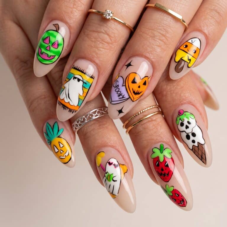 bright Halloween summer nail art with pumpkins ghosts and colorful icons