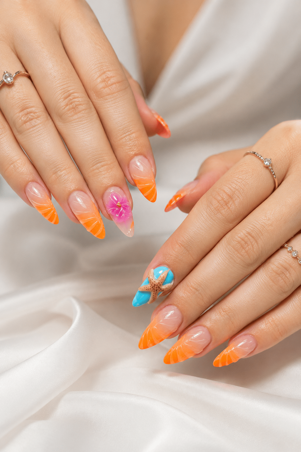 Bright orange blue summer nails 2026 with glossy colorful nail design