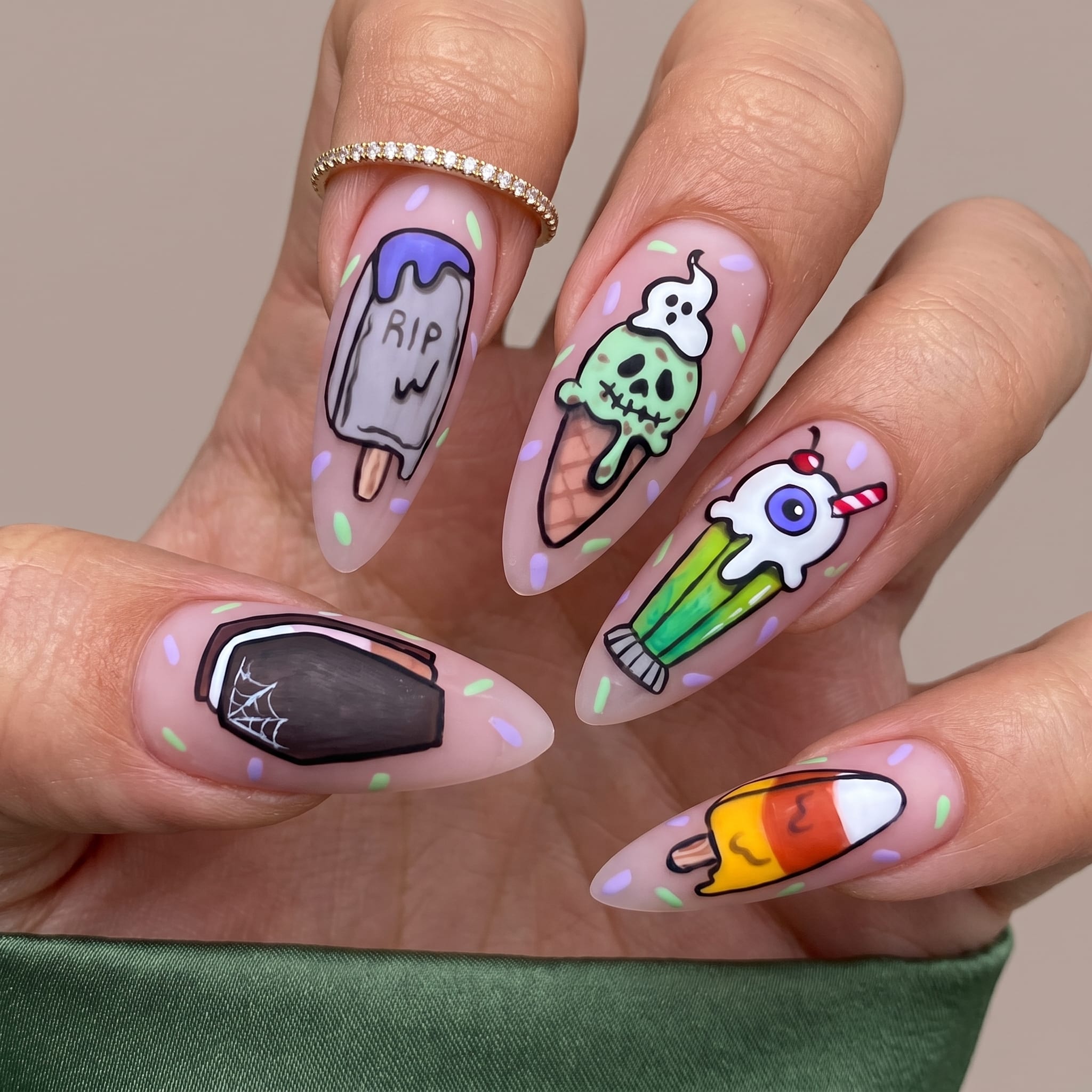 cartoon ghost pumpkin manicure with colorful Halloween summer details