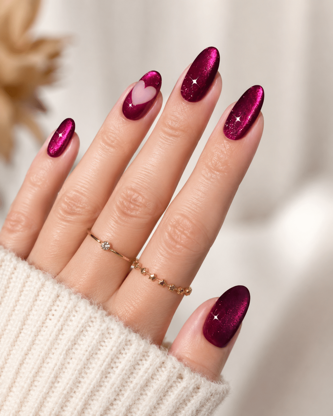 Dark berry cat eye nails with a rich pink magnetic finish