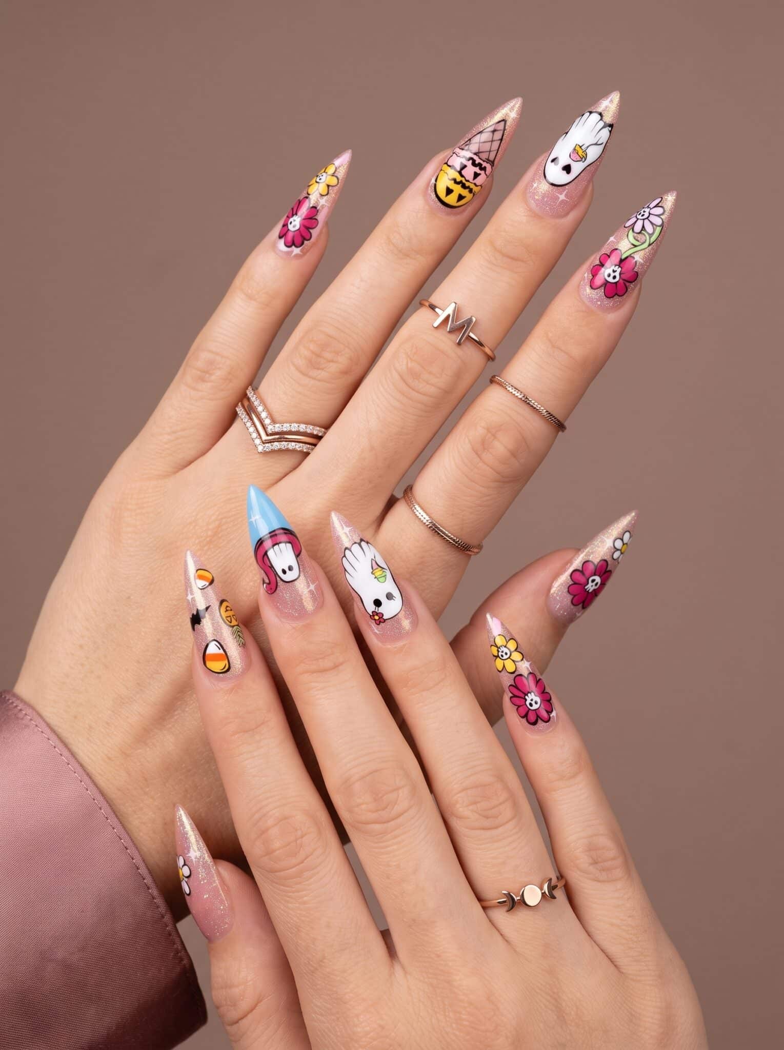 mixed pink Halloween summer manicure with tiny spooky nail art