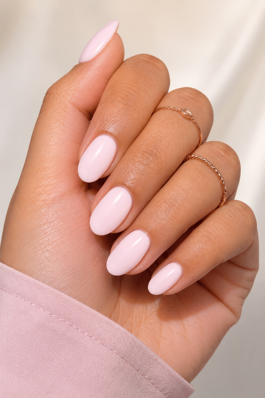 Neutral rosy pink gel polish with a smooth glossy finish