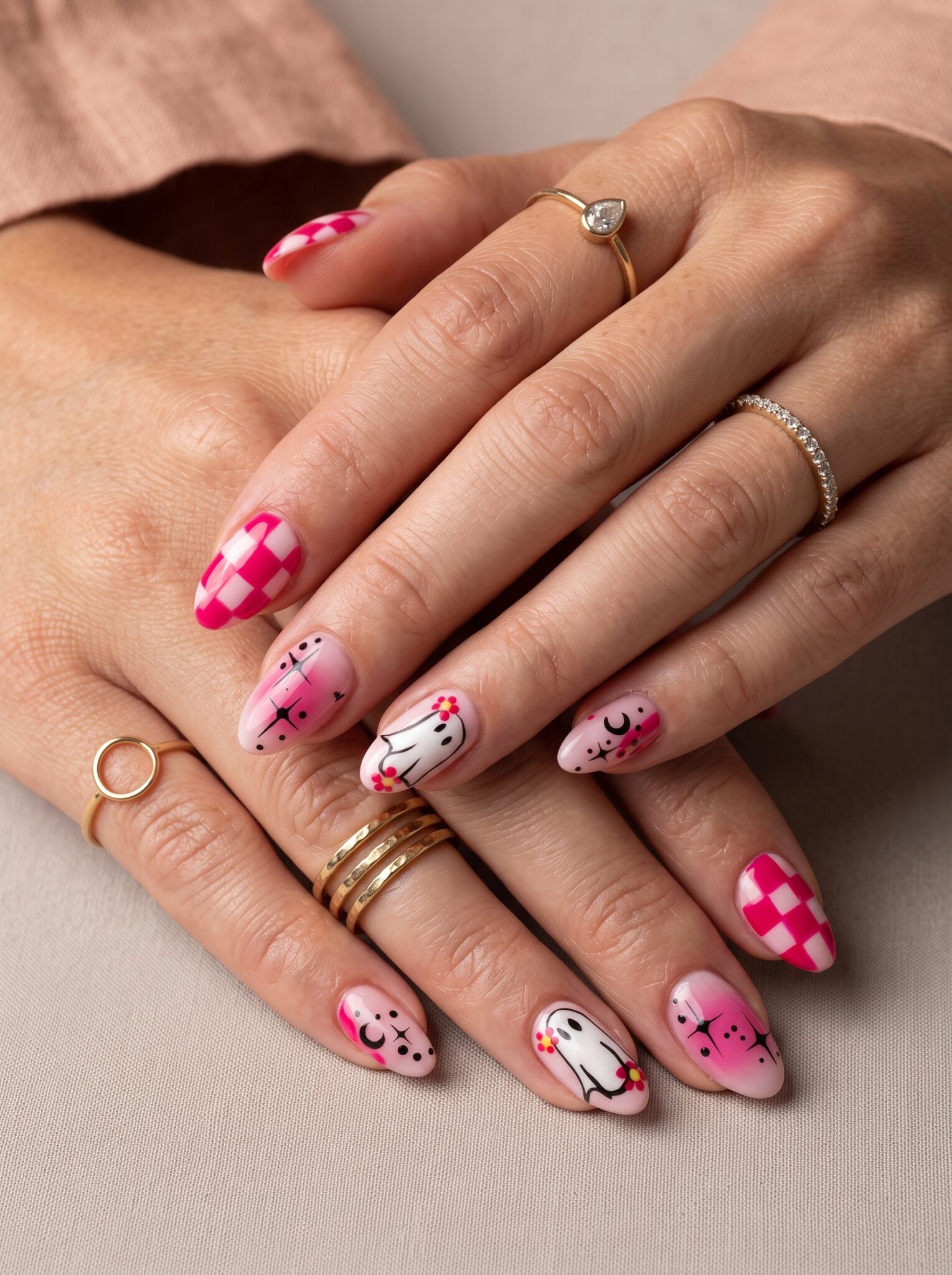 pink red spooky summer nails with cute Halloween fruit accents
