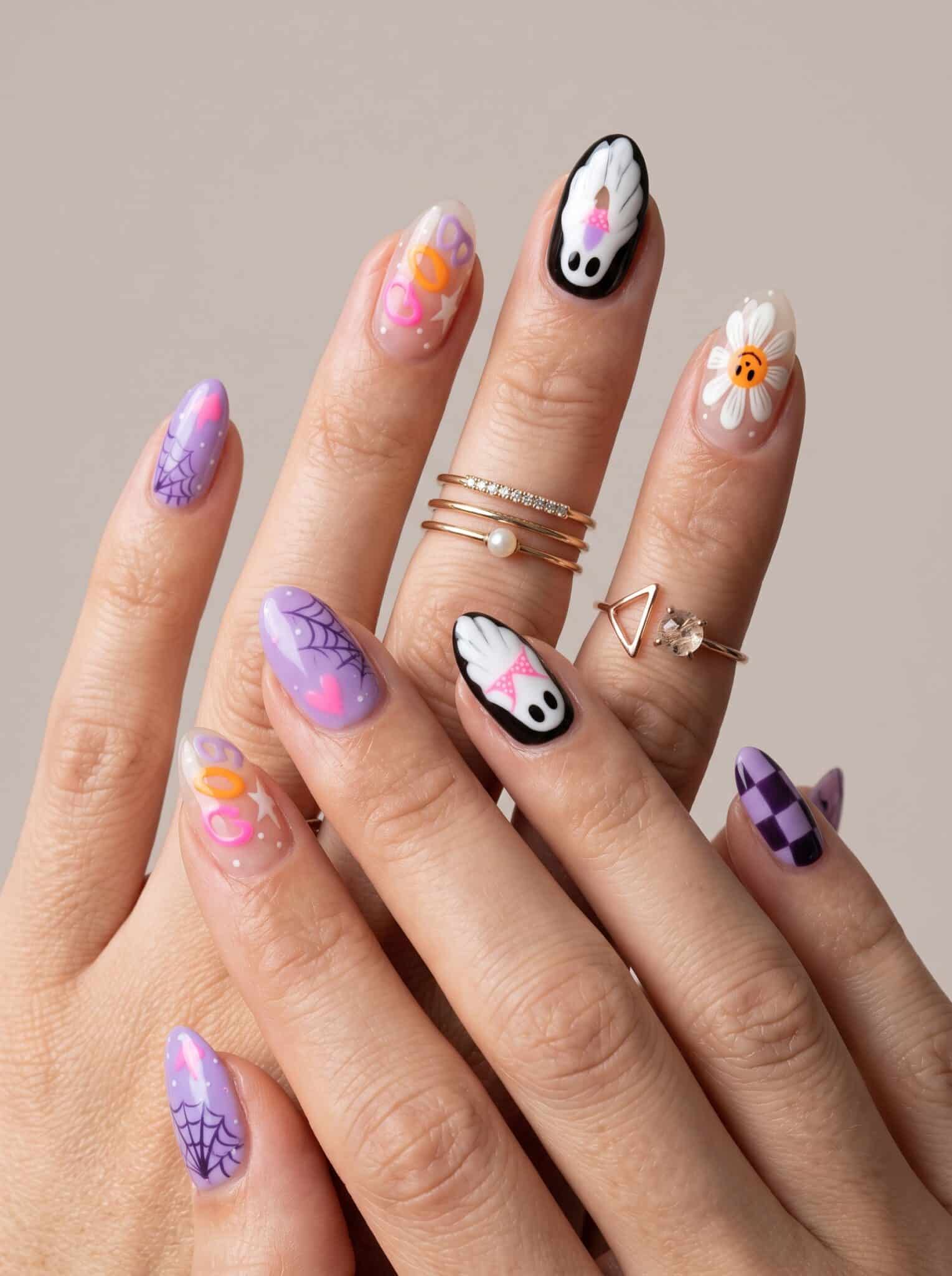 purple ghost summer nails with soft pastel spooky accents