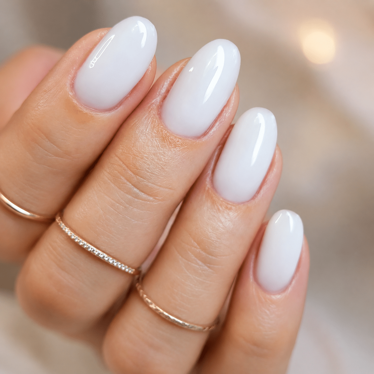 White French border gel polish with glossy outlined manicure design