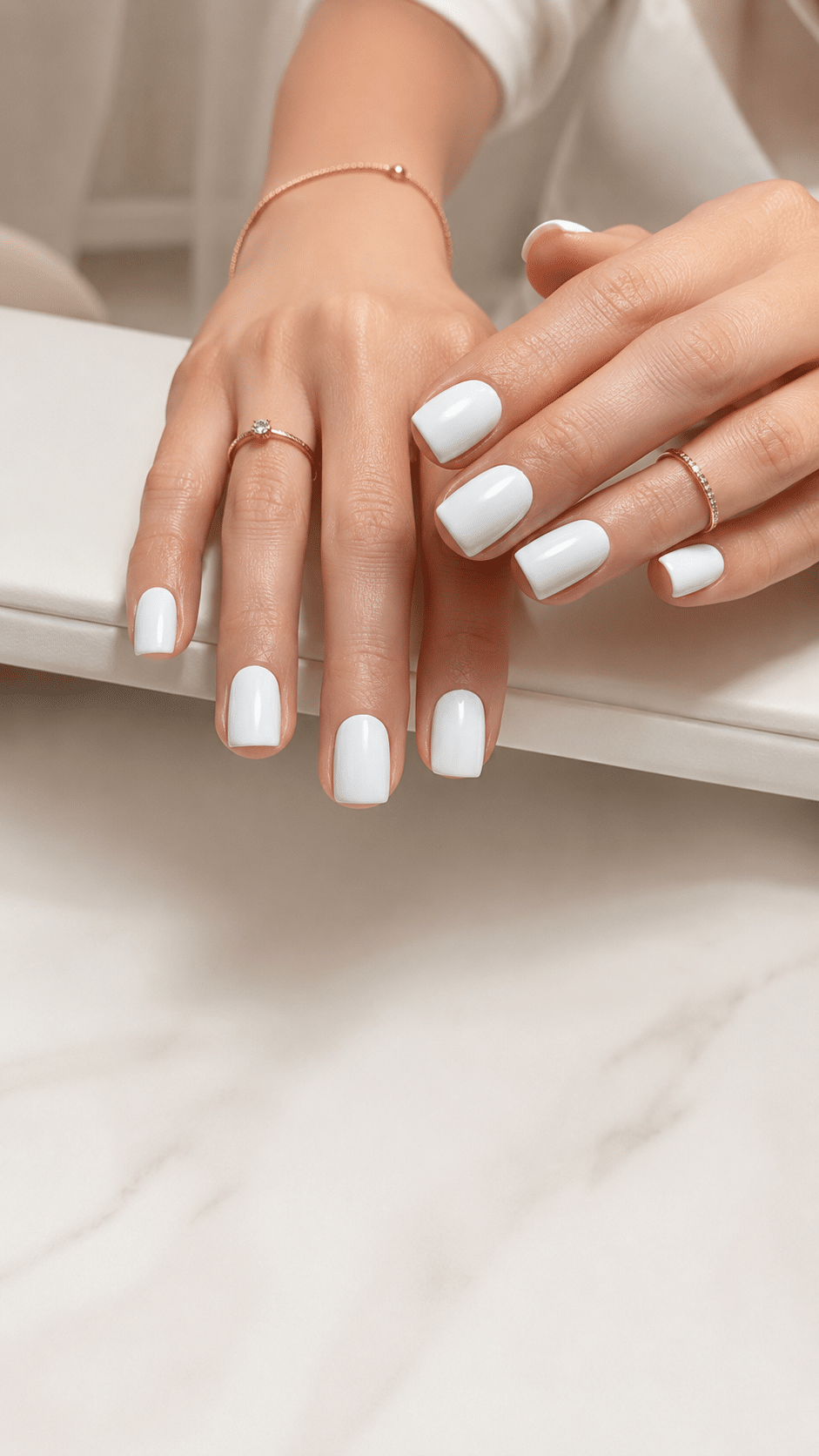 White square gel nail polish manicure with glossy salon finish