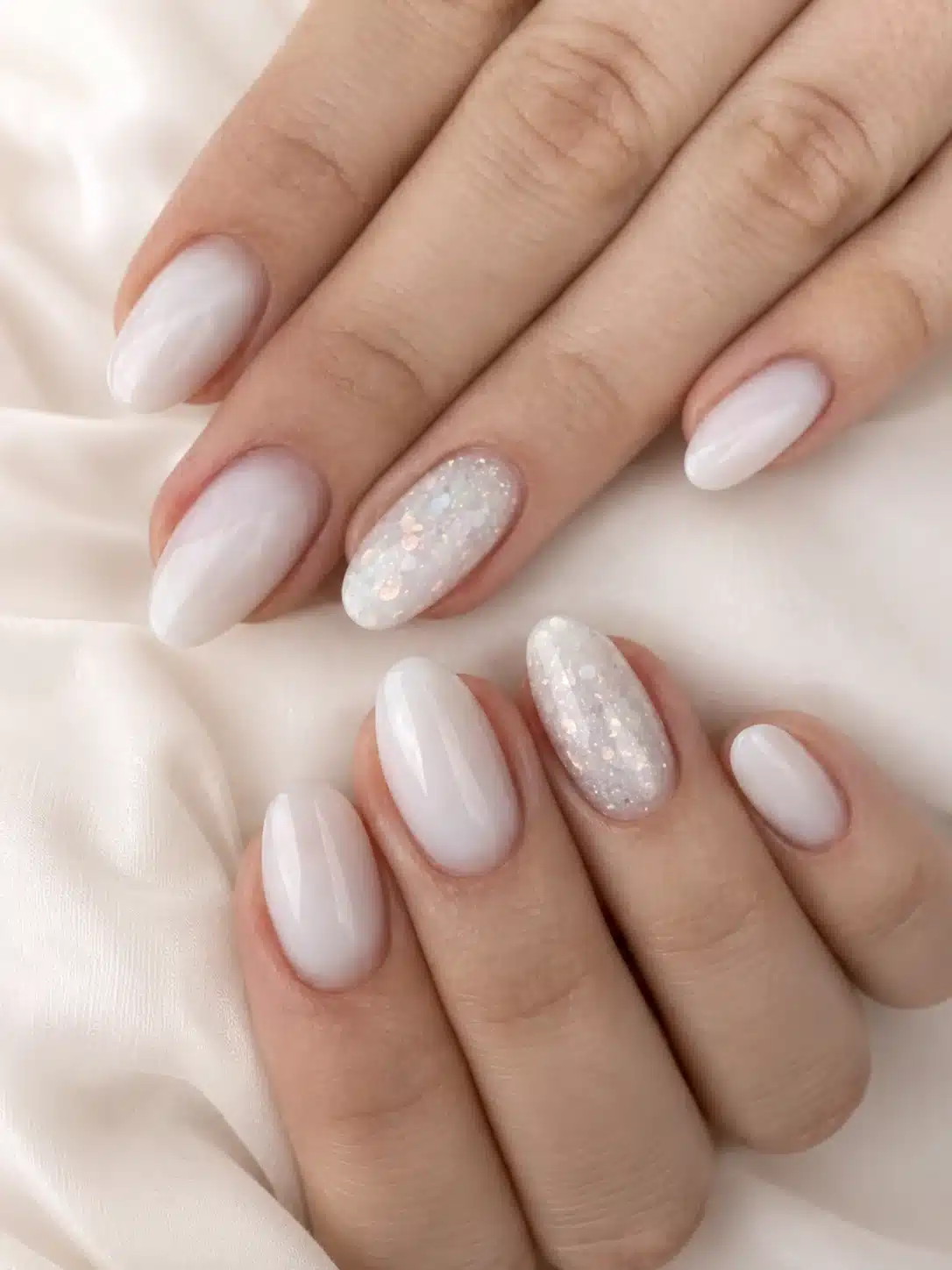 Milky White Nails With Glitter: 10 Soft, Sparkly Manicures 5 Pearl milky white nails with subtle sparkle