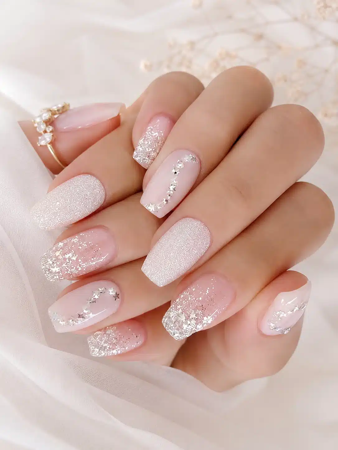 Milky White Nails With Glitter: 10 Soft, Sparkly Manicures 3 Pink leaning milky nails with soft glitter
