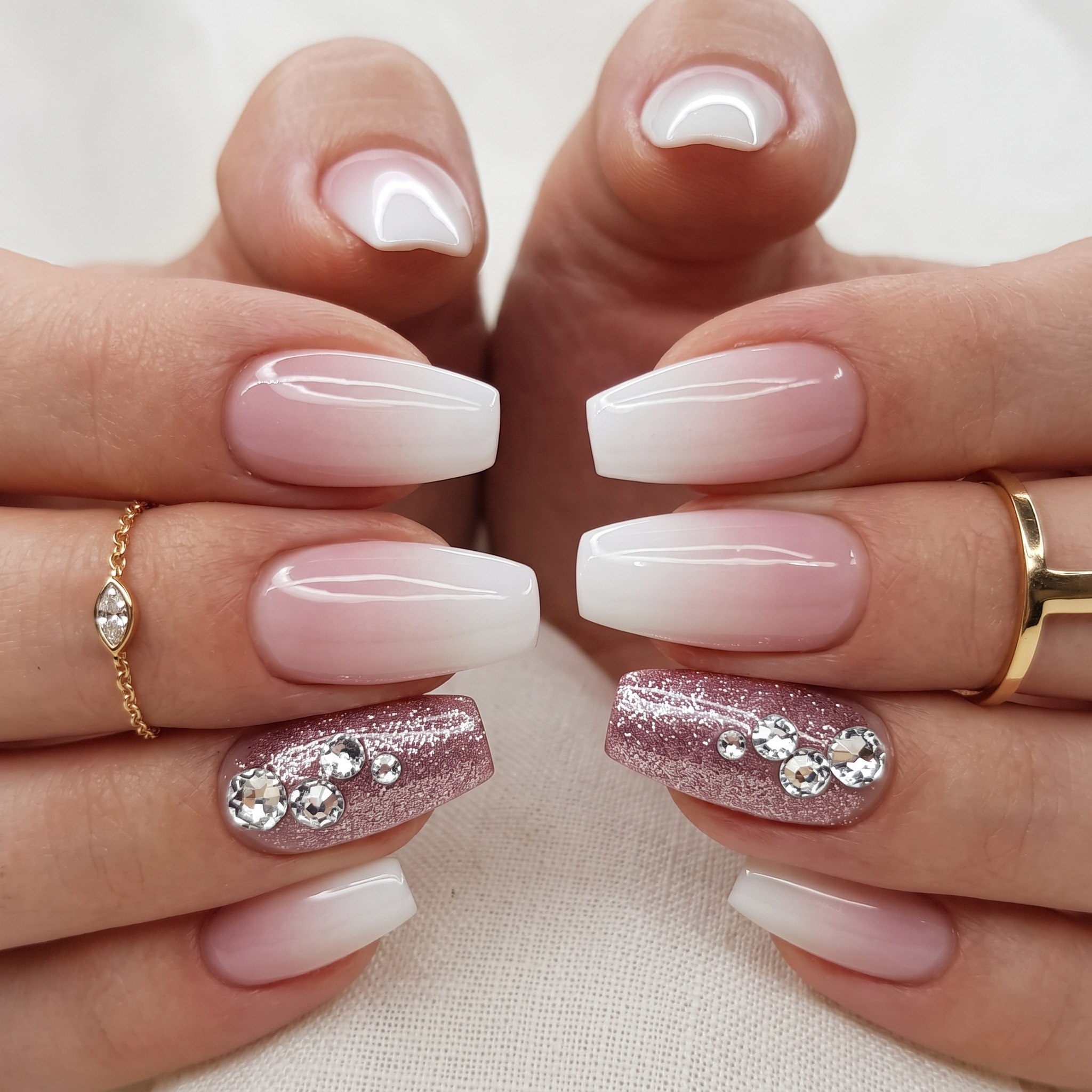 Rounded pink and white full set nails with a soft natural finish