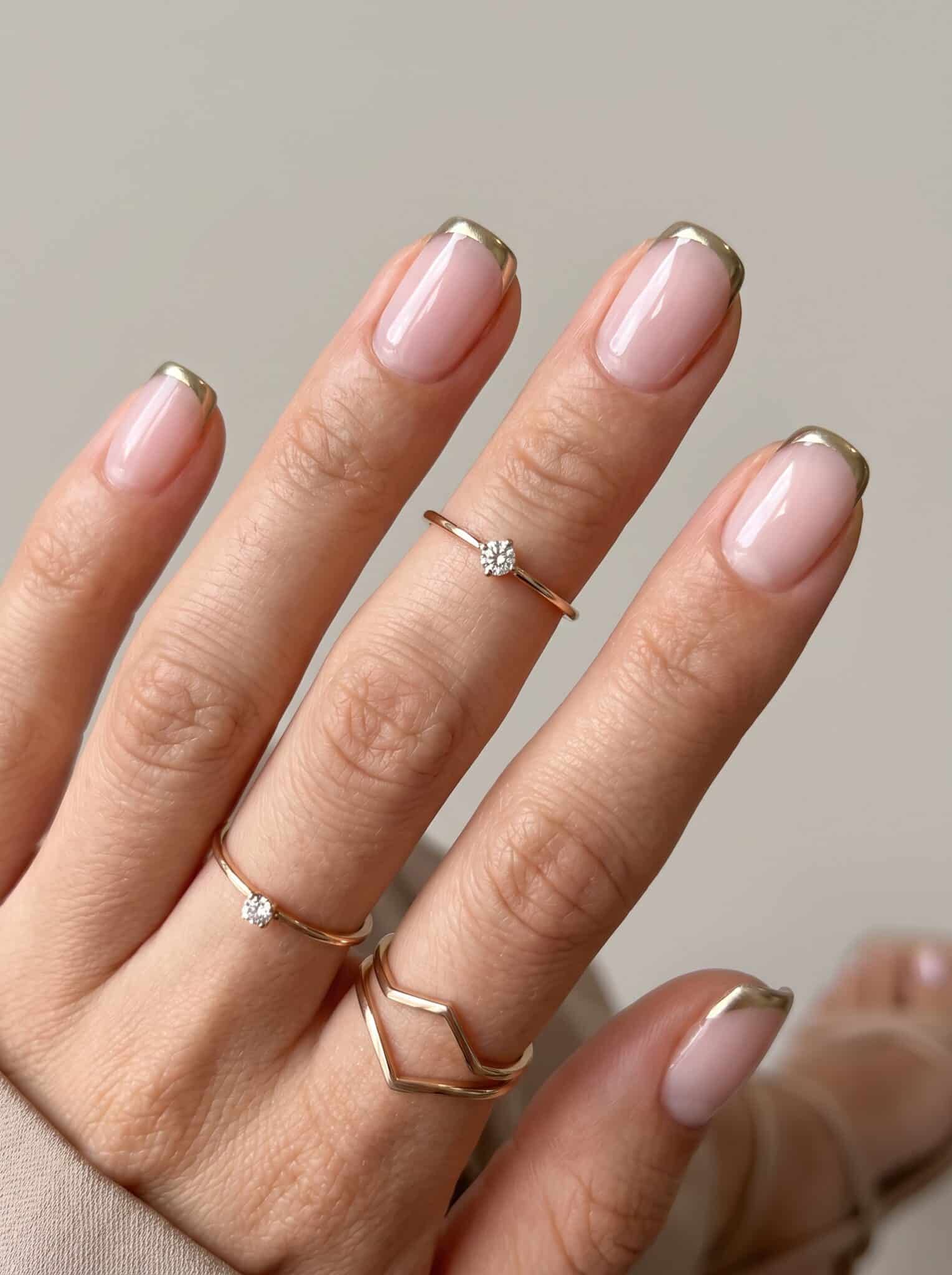 Natural blush pink oval manicure with a sheer glossy finish