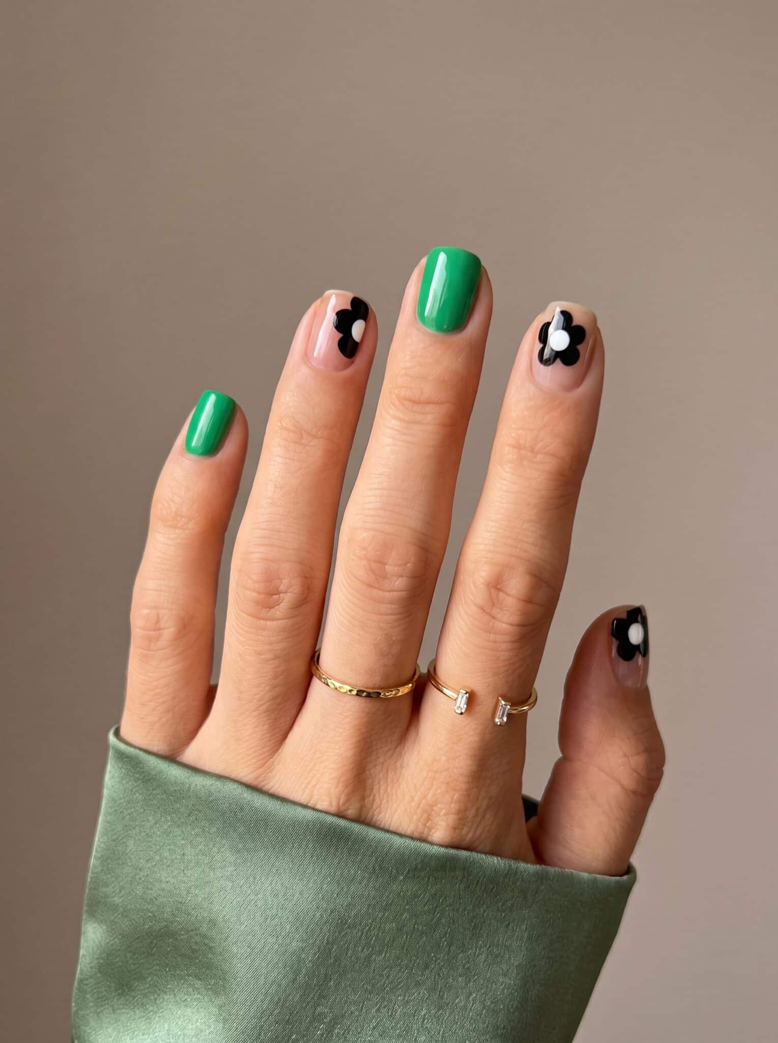 Nude manicure with blue and white abstract nail art