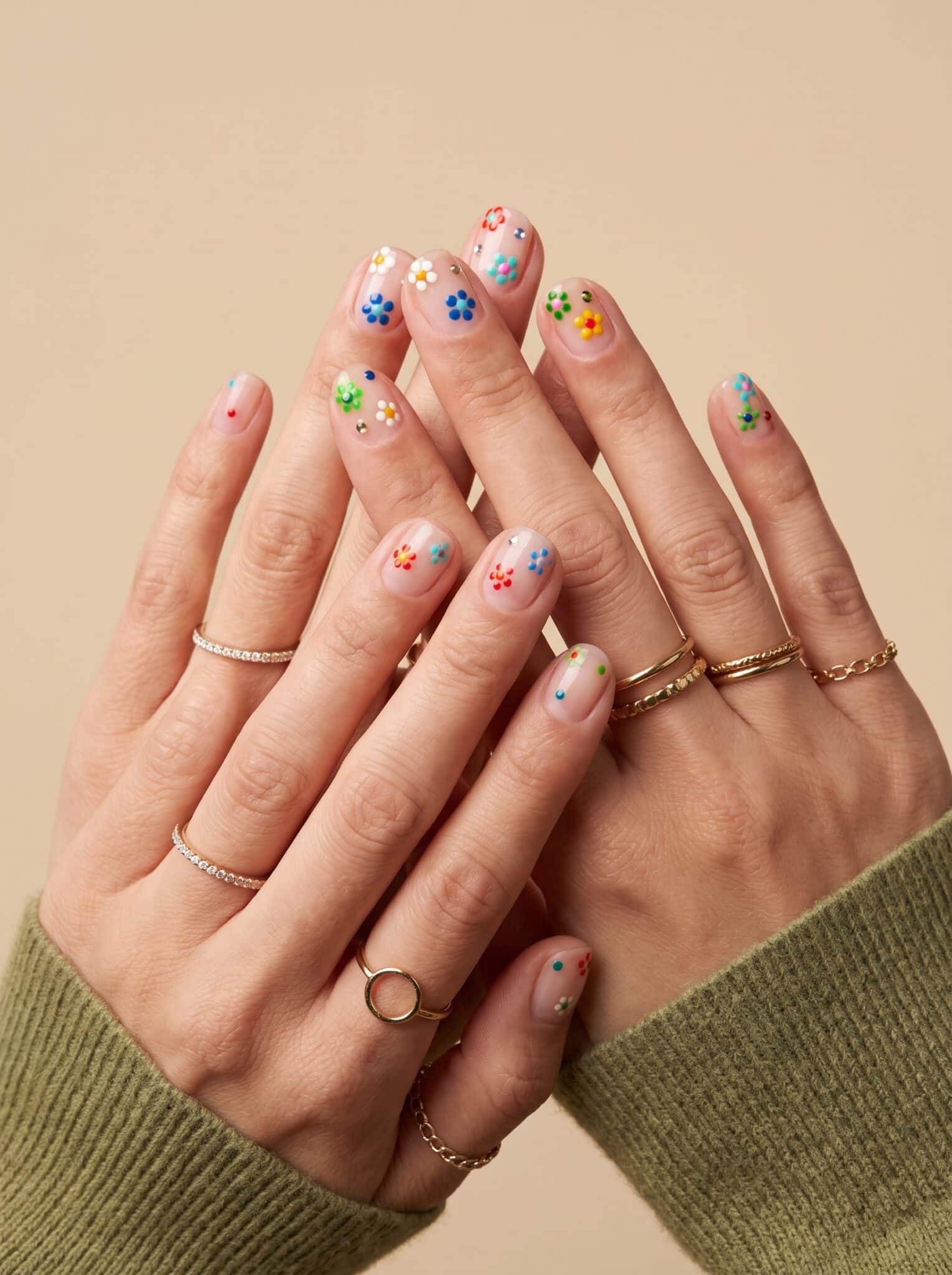 Nude nails with colorful abstract summer-inspired details