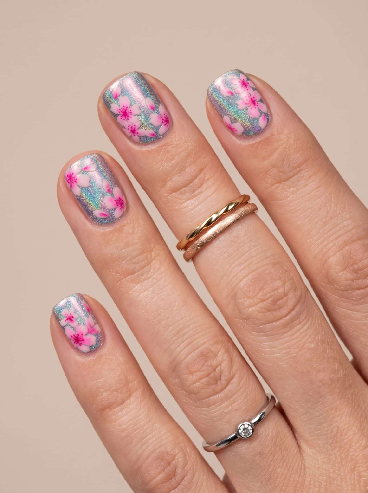 Mix-and-match neon manicure with orange pink yellow and black nails
