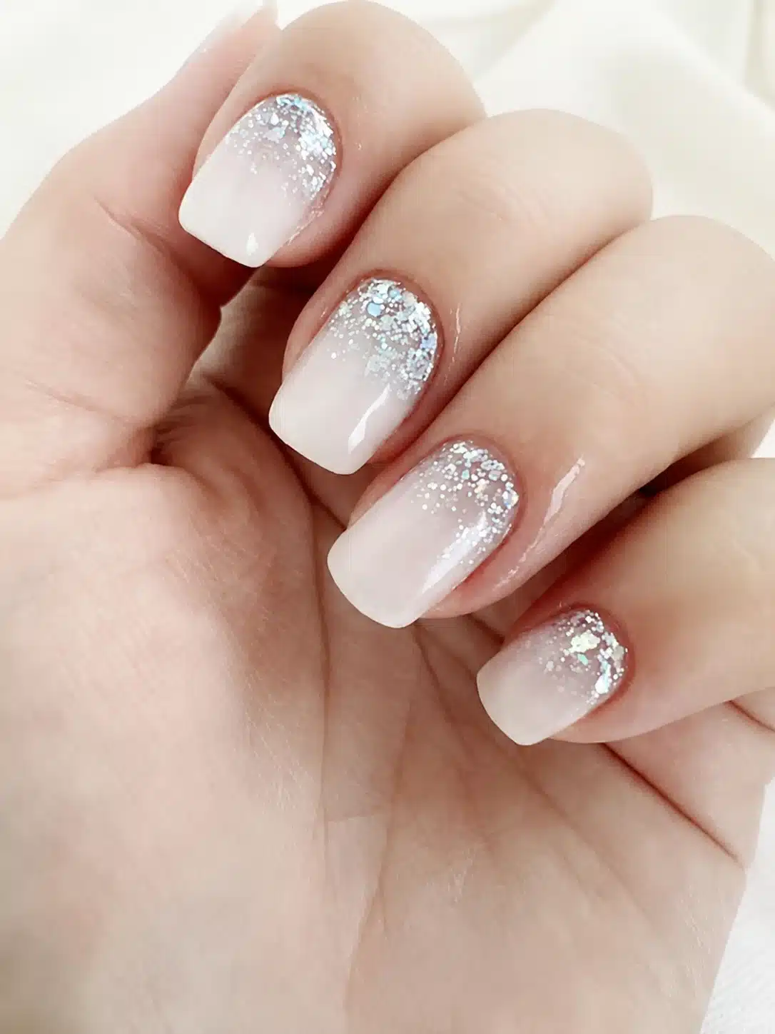 Milky White Nails With Glitter: 10 Soft, Sparkly Manicures 10 Milky white nails with silver glitter accent nails