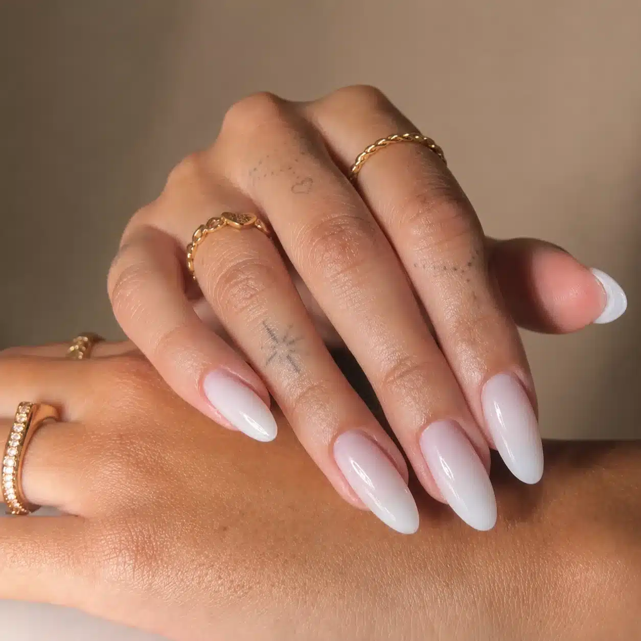 Milky White Almond Nails: 9 Clean-Girl Looks 3 Soft pink leaning milky white almond nails