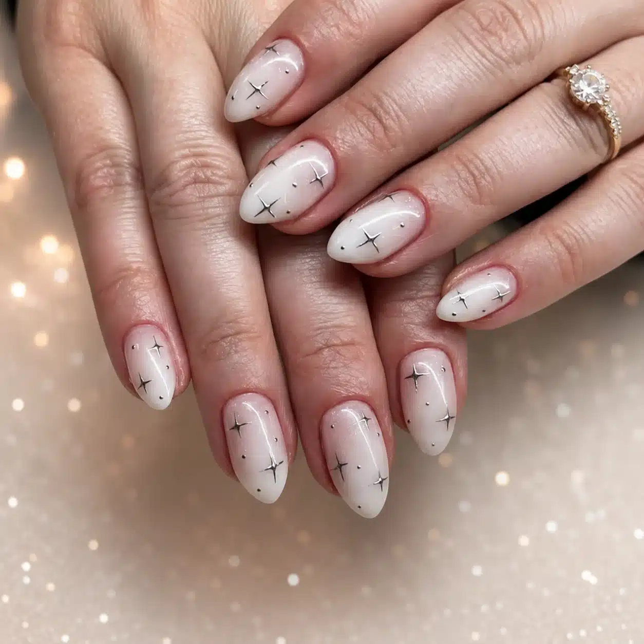 Milky White Almond Nails: 9 Clean-Girl Looks 5 Milky white almond nails with delicate star details