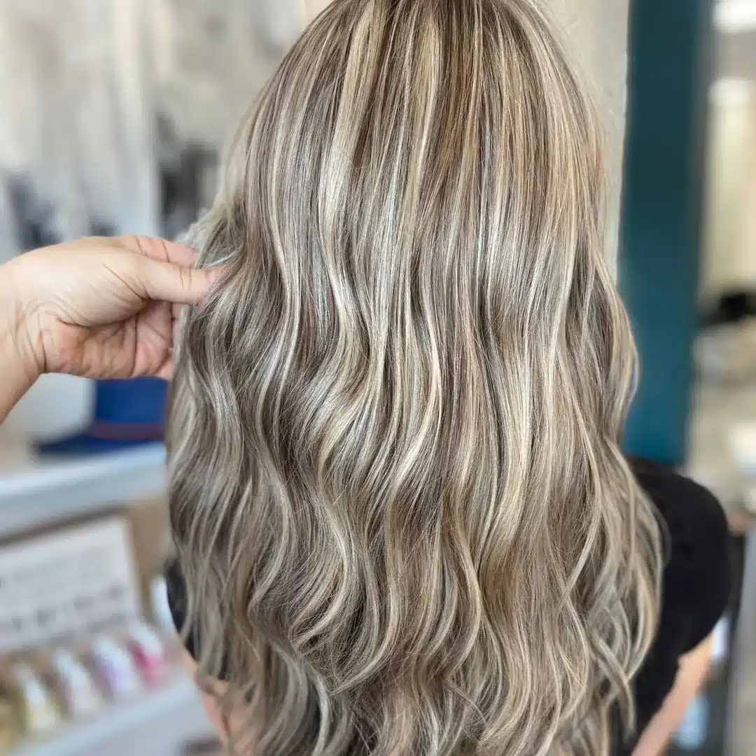 15 Chic Highlights Hair Color Ideas 15 Long waves with icy beige blonde highlights offering a bright modern contrast