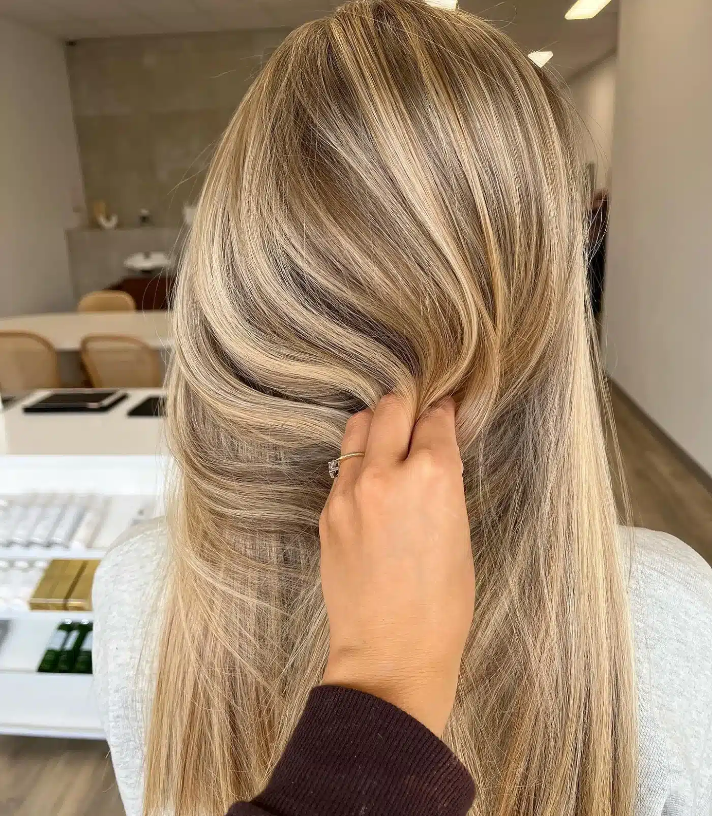 15 Chic Highlights Hair Color Ideas 17 Sleek long hair with pearl blonde highlights delivering a glossy elegant look