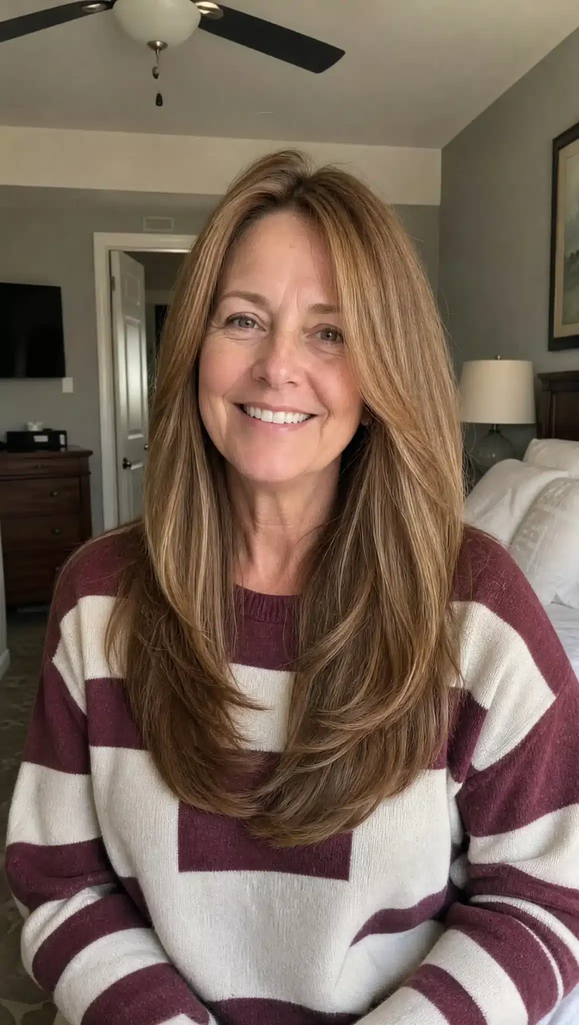 Long Layered Curls with Warm Chestnut Highlights | Long Hairstyles for Women Over 50 Long Layered Curls with Warm Chestnut Highlights - long hairstyles for women over 50