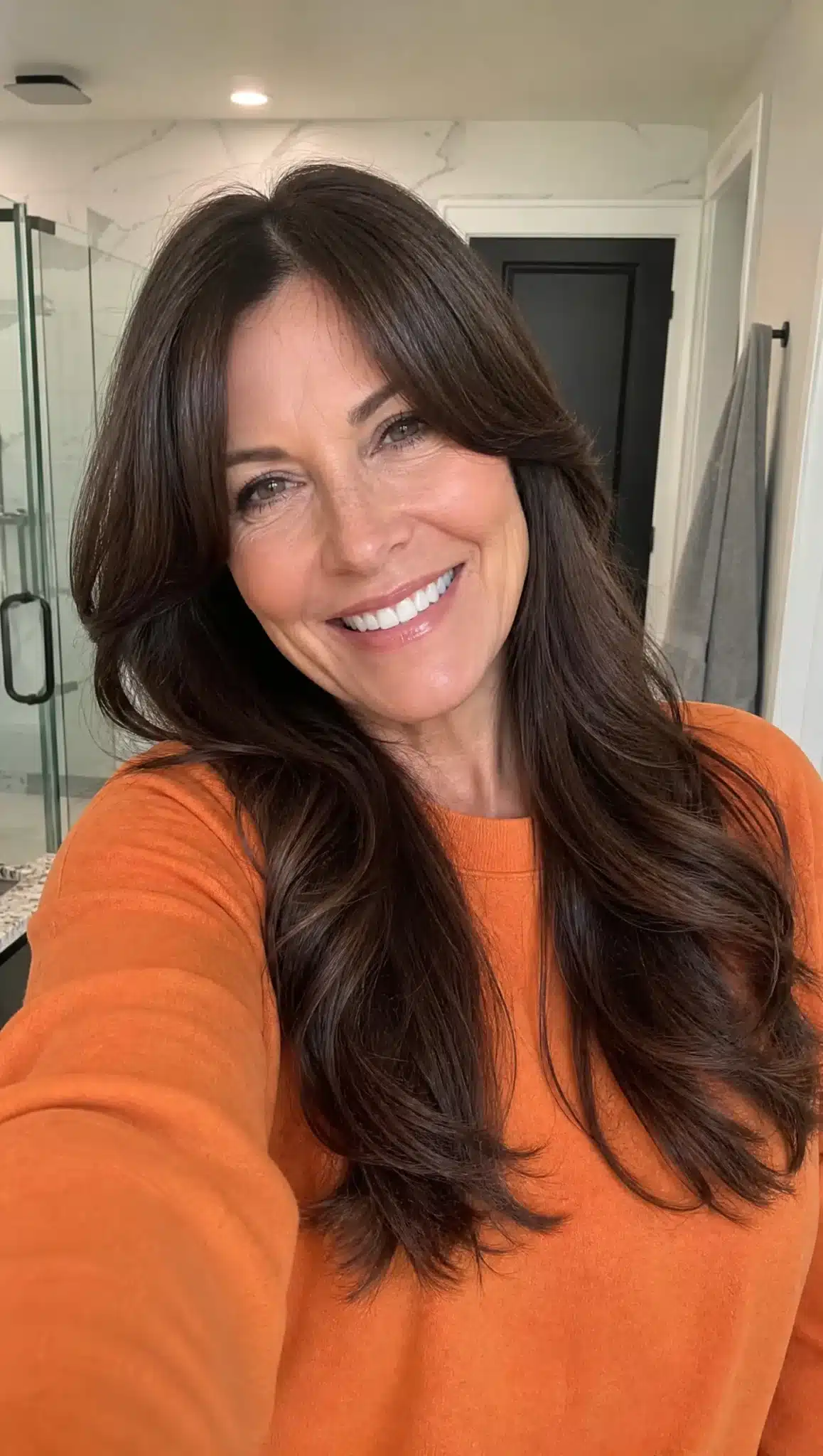 Long Silver Layers with Side-Swept Bangs | Long Hairstyles for Women Over 50 Long Silver Layers with Side-Swept Bangs - long hairstyles for women over 50