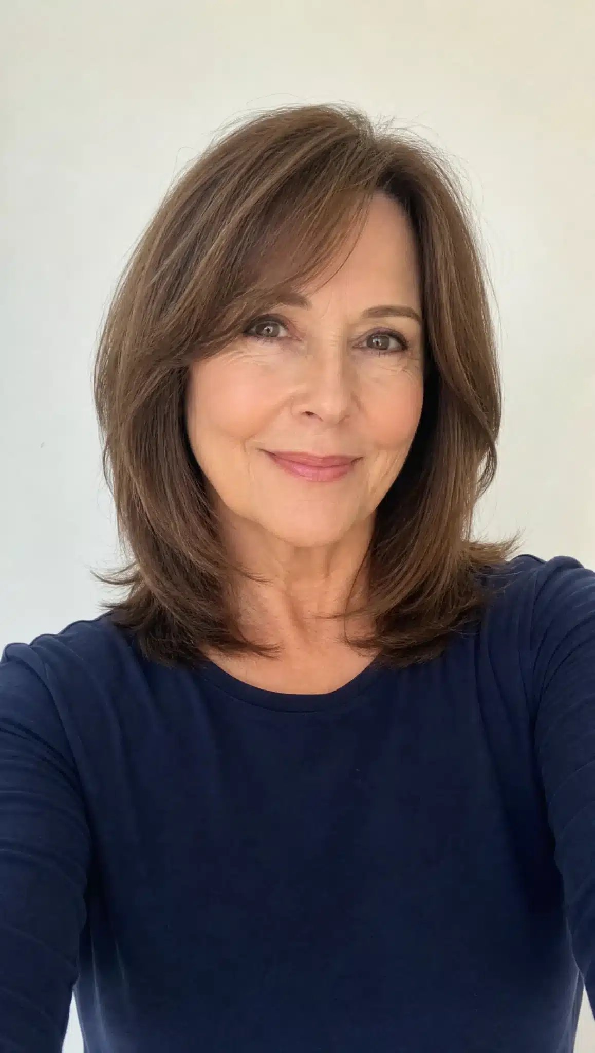 27 Chic Shoulder Length Hairstyles For Women Over 60 15 Graduated shoulder cut with medium brown hair featuring 27 chic shoulder length hairstyles for women over 60.