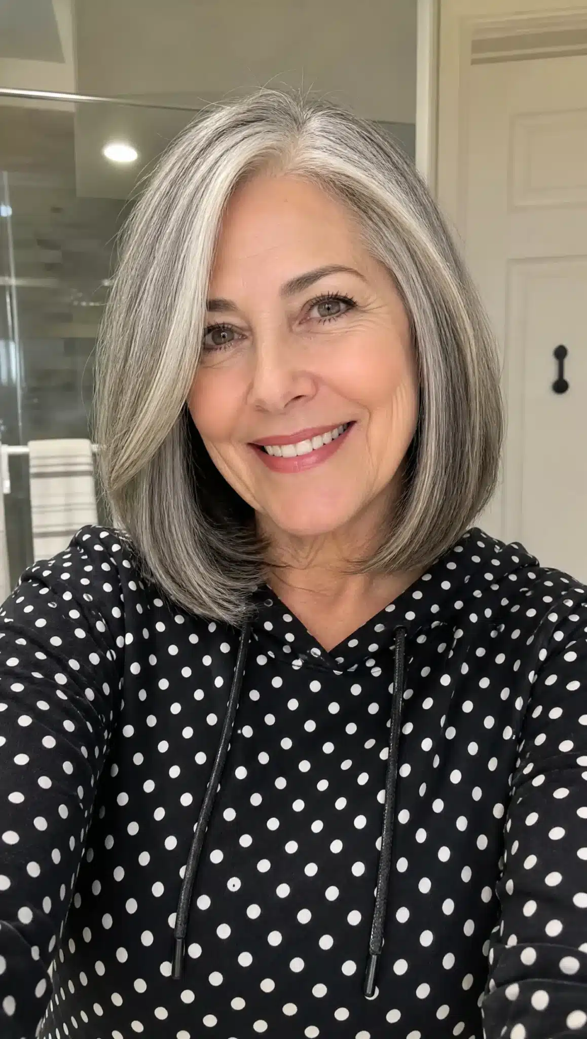 27 Chic Shoulder Length Hairstyles For Women Over 60 23 Rounded lob with natural gray hair representing 27 chic shoulder length hairstyles for women over 60.