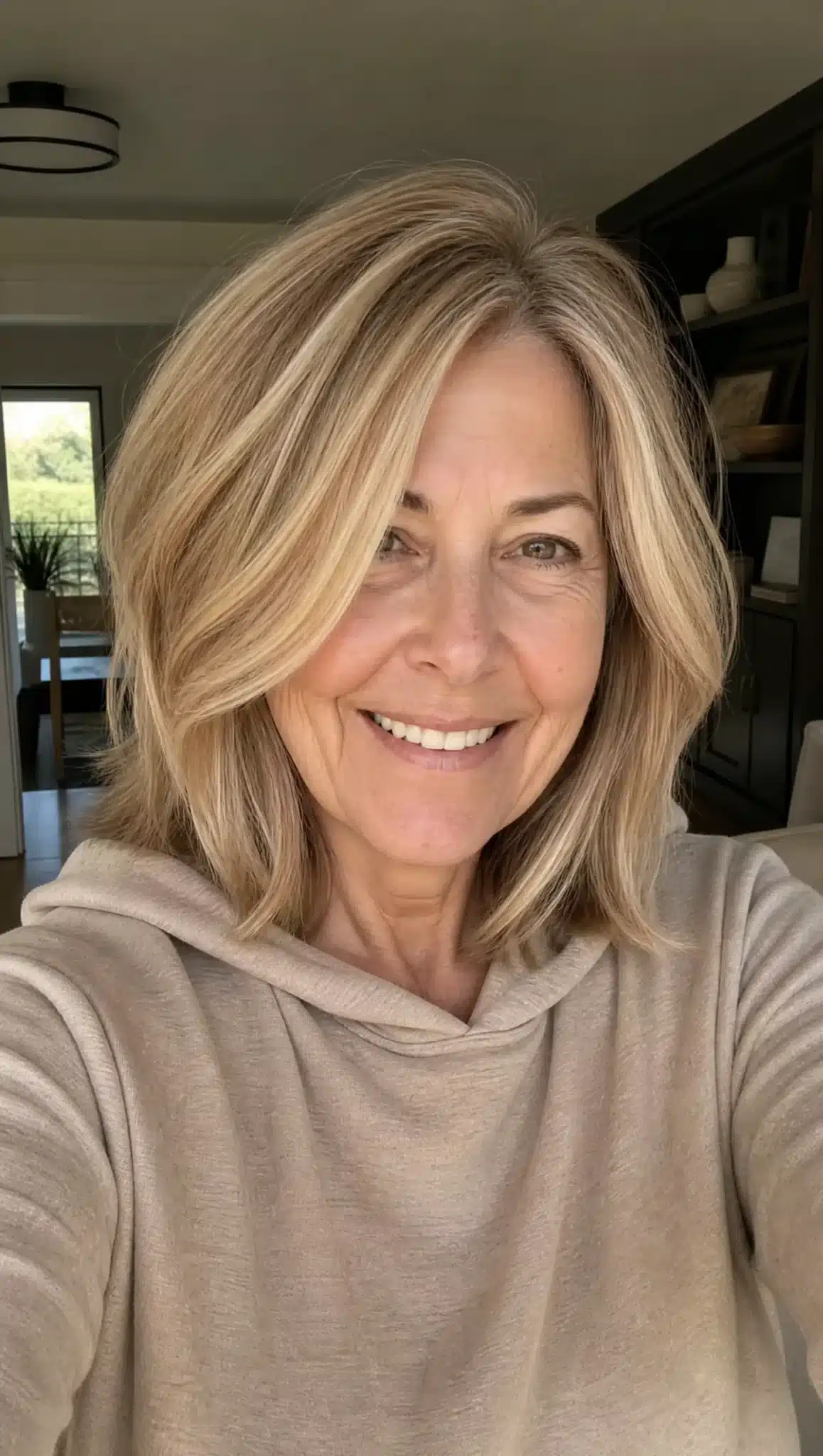 27 Chic Shoulder Length Hairstyles For Women Over 60 9 Face-framing lob with honey blonde tones displaying 27 chic shoulder length hairstyles for women over 60.