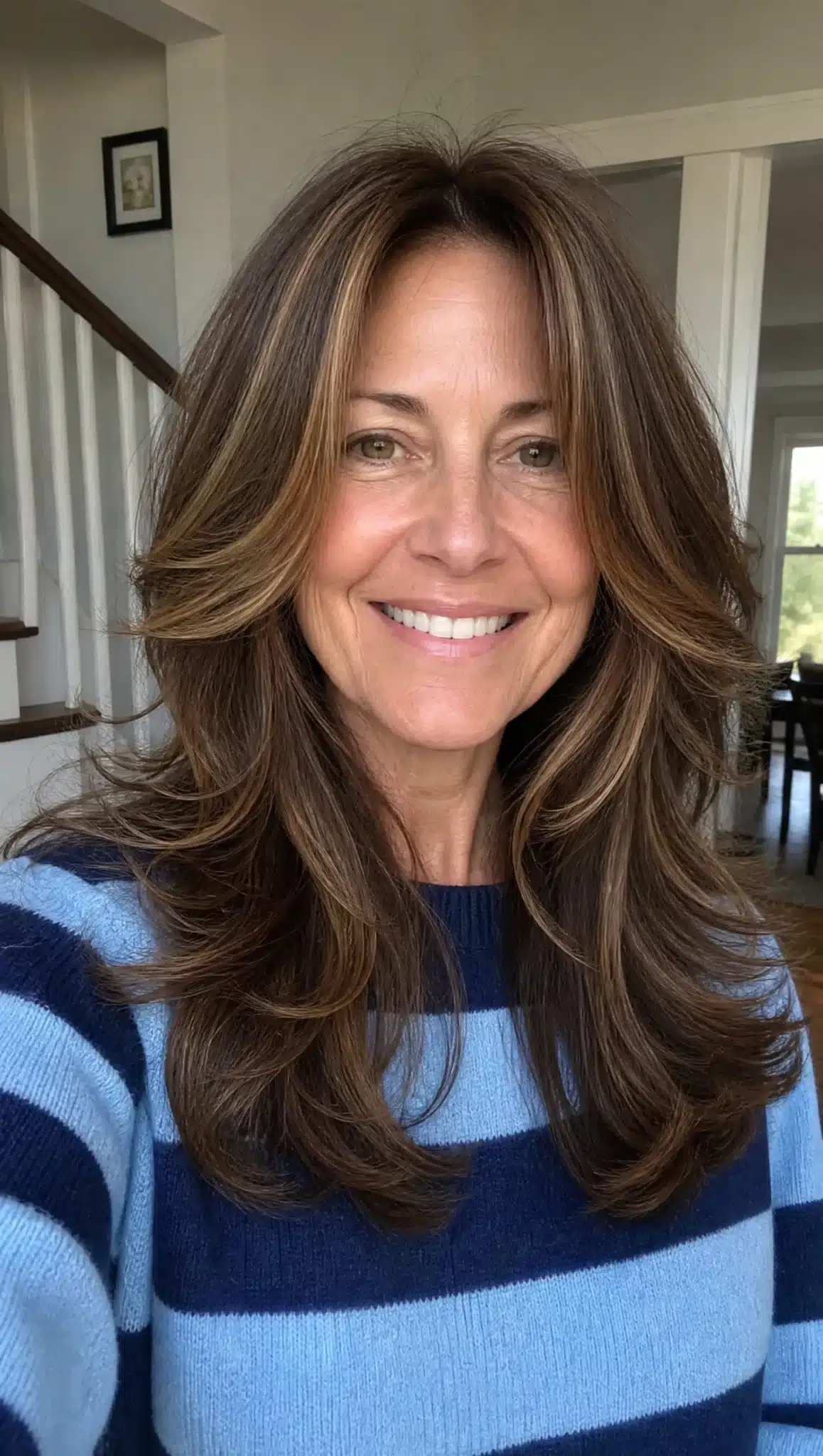 27 Must-See Trendy Hairstyles for Women Over 40 11 8. Butterfly Layers with Golden Brown Highlights (Trendy Hairstyles For Women Over 40) - Trendy Hairstyles For Women Over 40