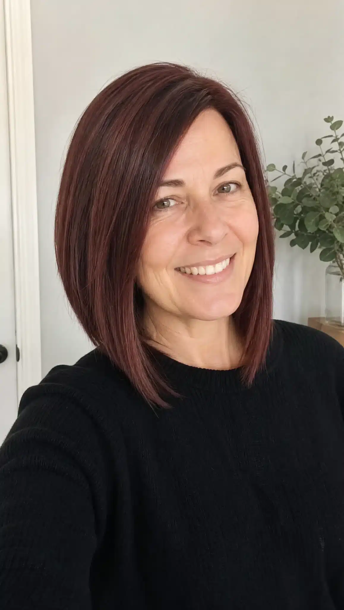 27 Must-See Trendy Hairstyles for Women Over 40 27 24. Angled Lob with Rich Mahogany Brown (Trendy Hairstyles For Women Over 40) - Trendy Hairstyles For Women Over 40