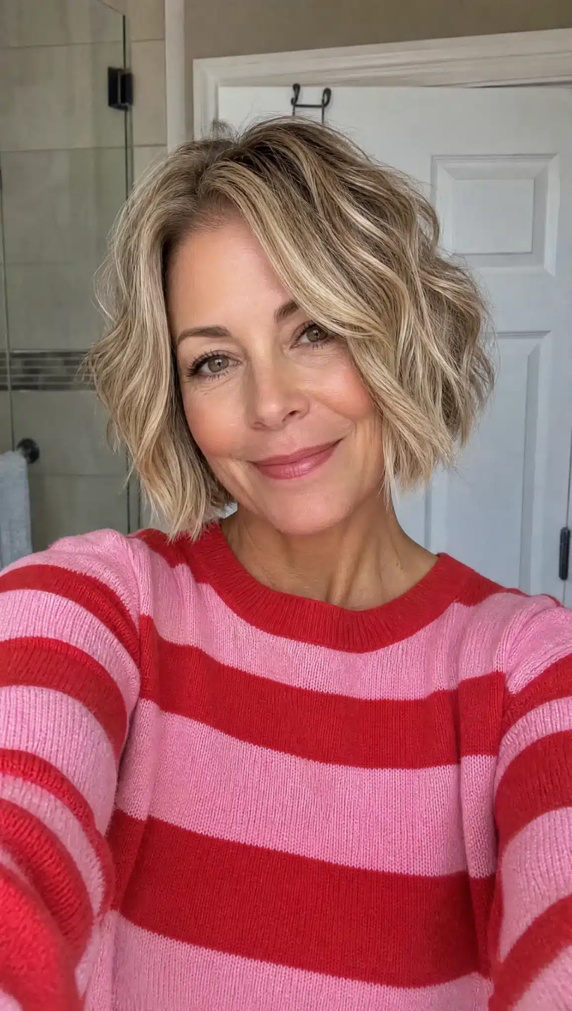 27 Stunning Angled Bob Hairstyles For Older Women 12 Wavy angled bob with sandy blonde dimension