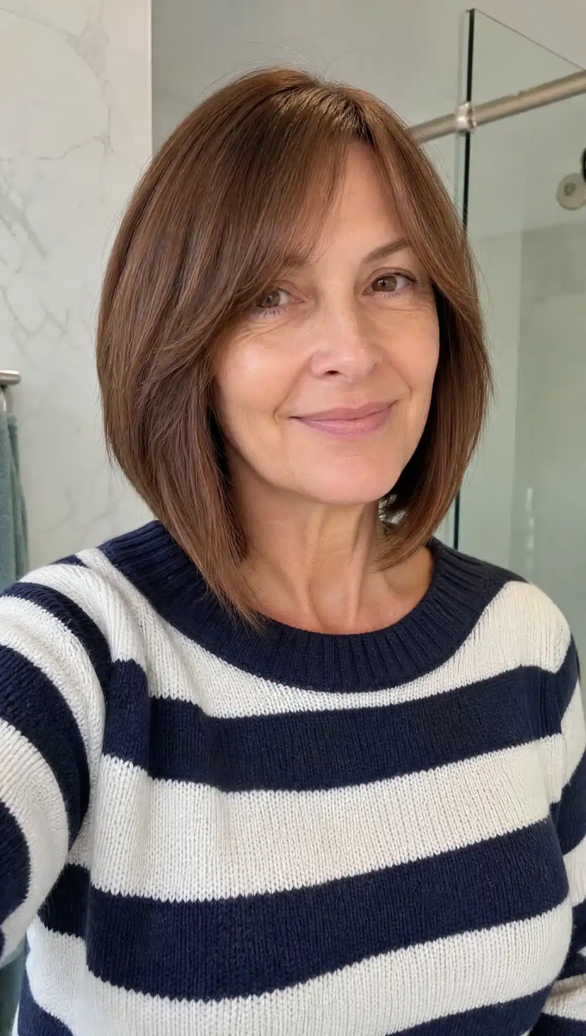 27 Stunning Angled Bob Hairstyles For Older Women 19 Angled bob with curtain bangs in warm brunette