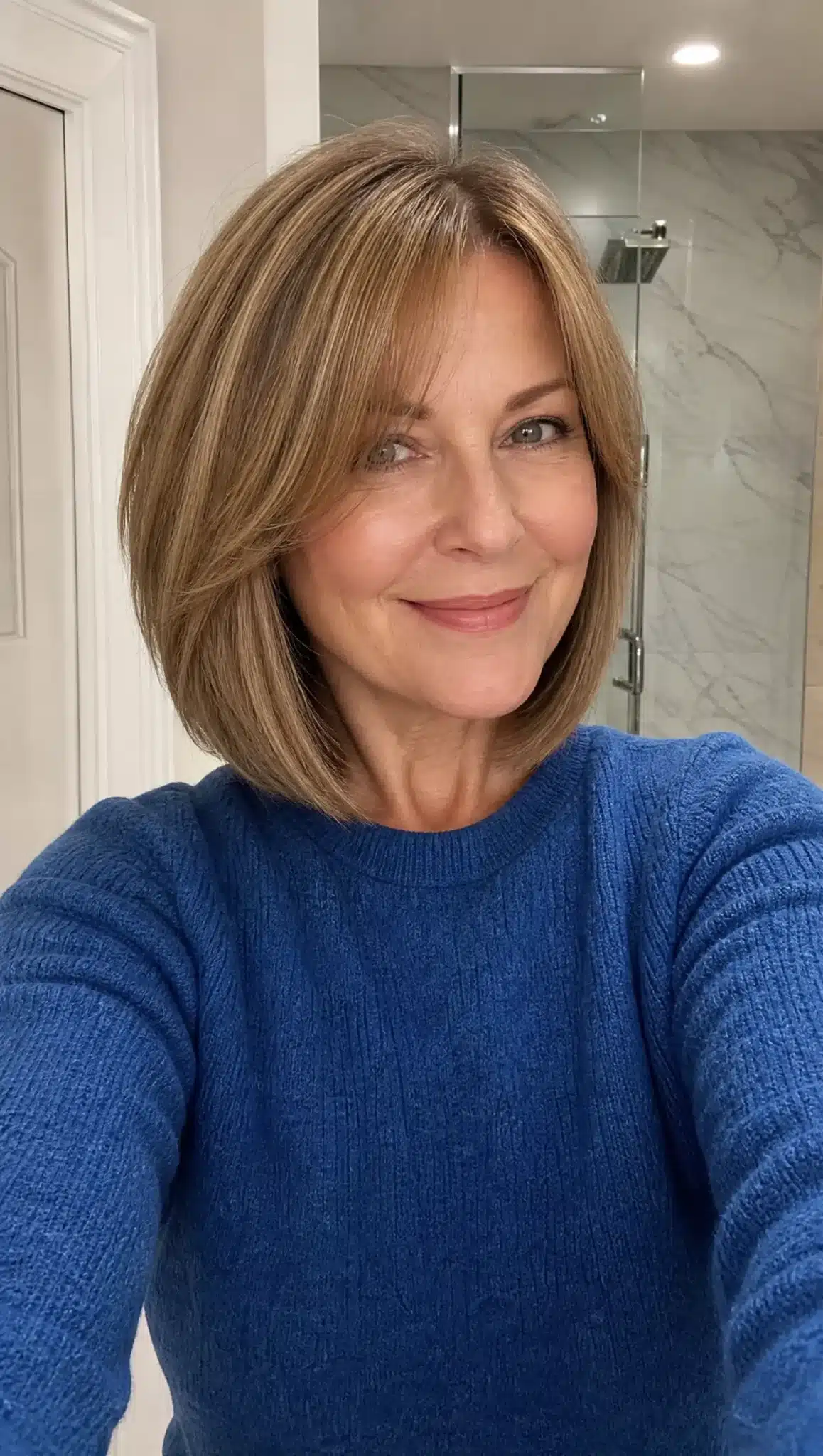 21. Angled Bob with Curtain Bangs and Golden Brown (Angled Bob Hairstyles For Women Over 50) - Angled Bob Hairstyles For Women Over 50