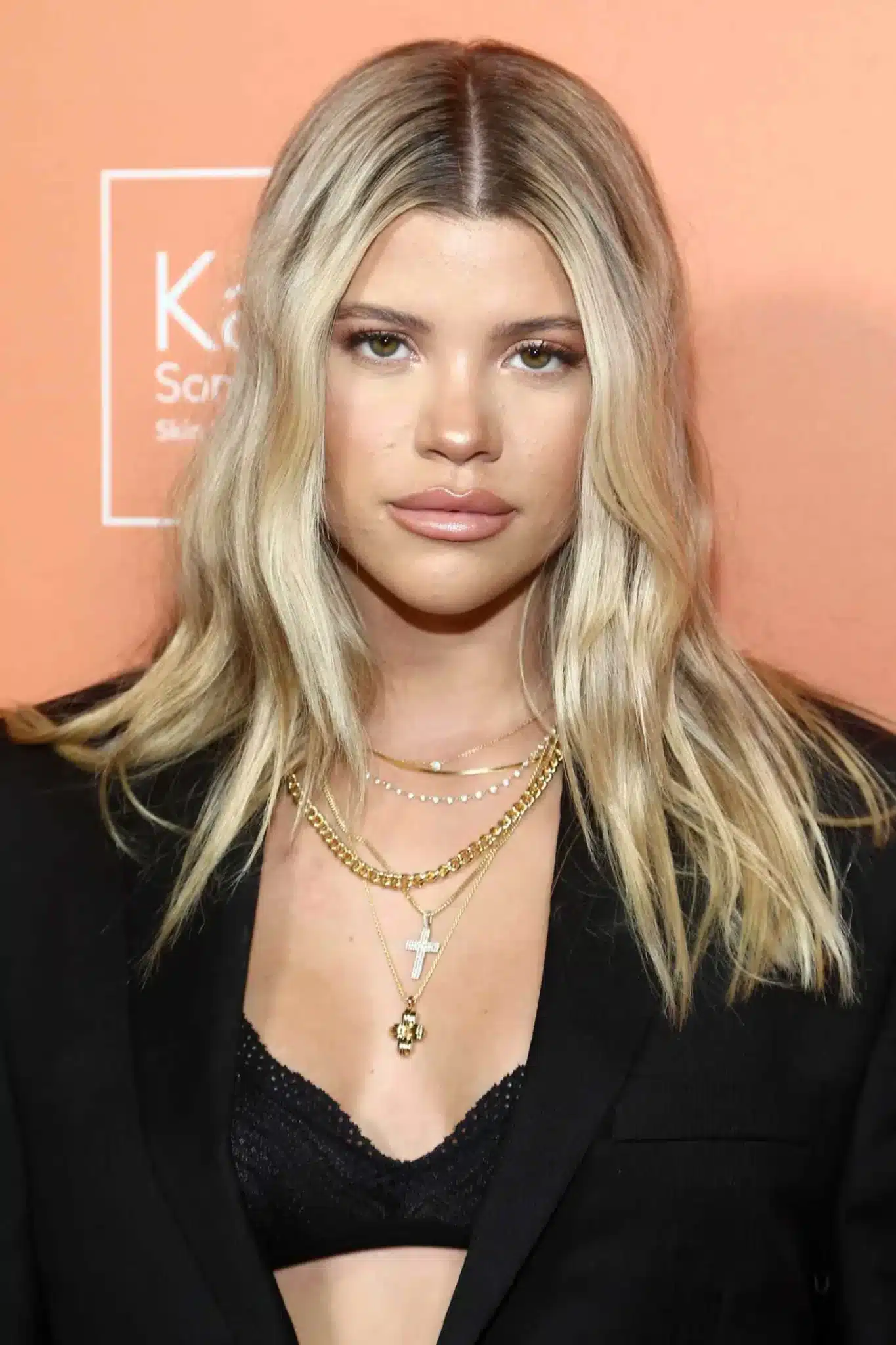 Sofia Richie sporting a blonde medium cut in 35+ Polished Low-Maintenance Medium-Length Haircuts