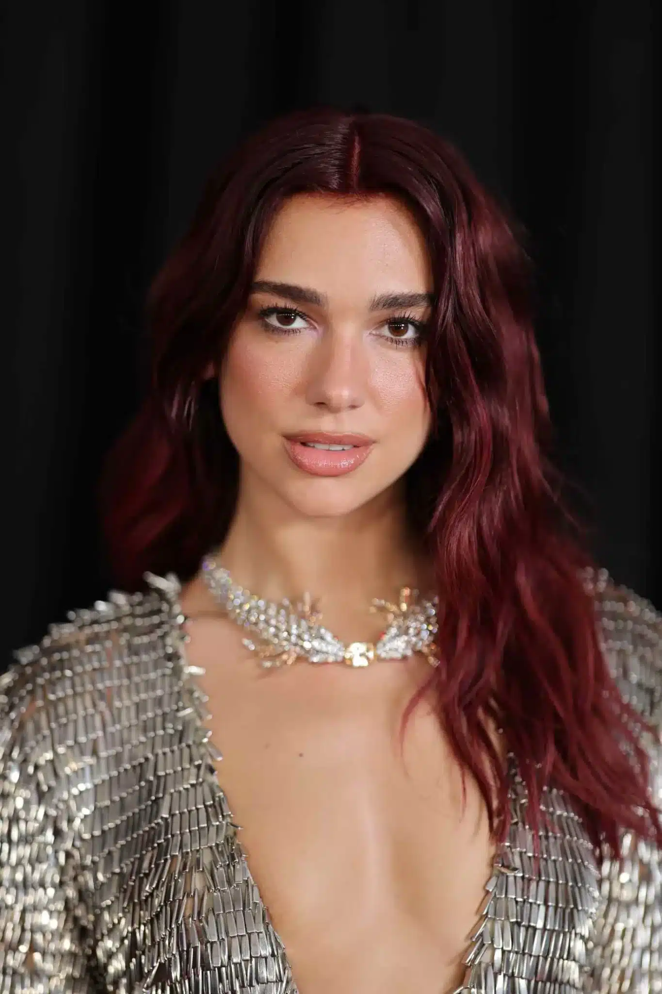 Dua Lipa rocking a tousled medium cut from 35+ Polished Low-Maintenance Medium-Length Haircuts