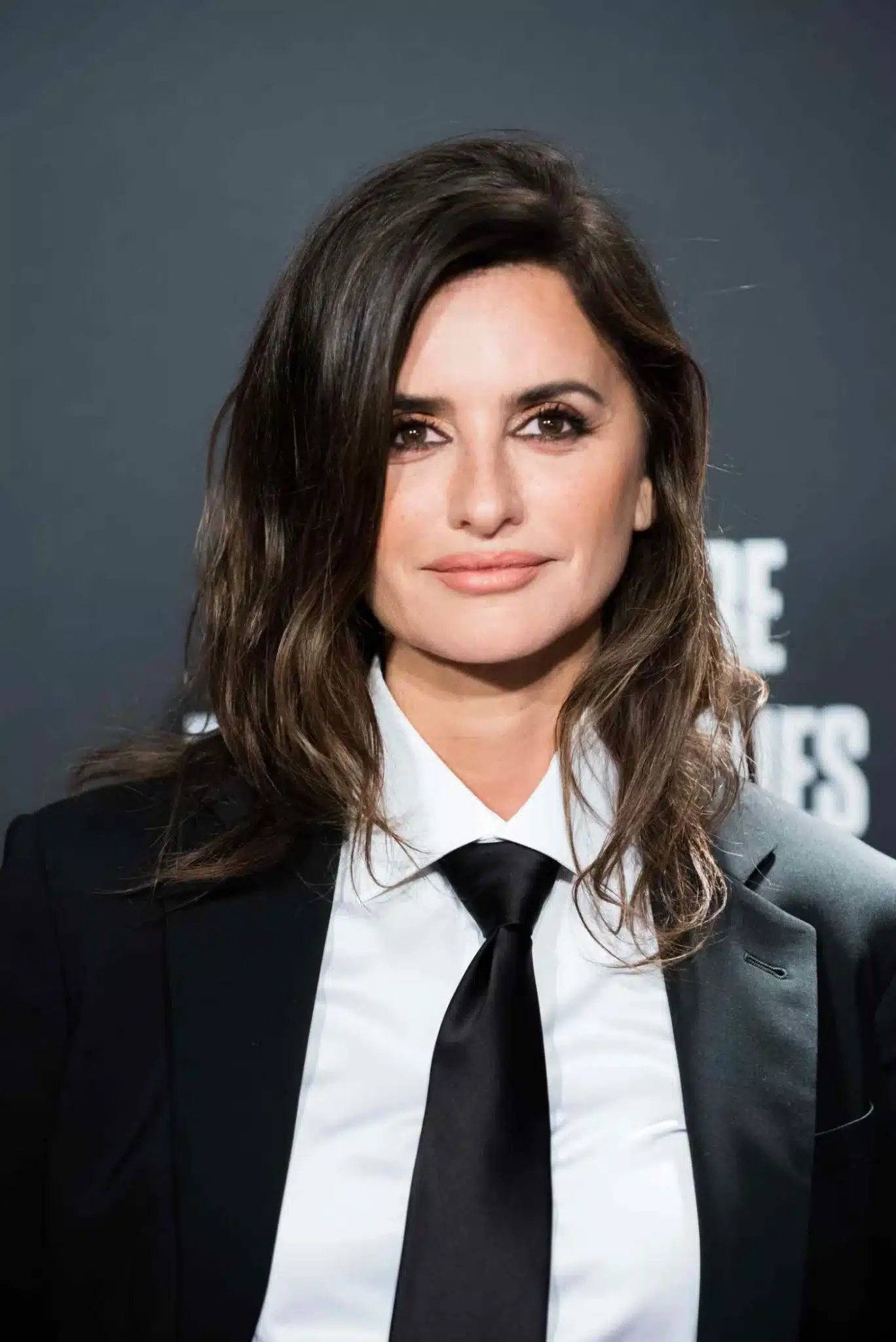 Penelope Cruz showcasing a tousled medium cut from 35+ Polished Low-Maintenance Medium-Length Haircuts