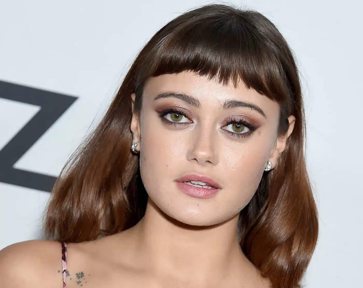 Ella Purnell modeling baby bangs in 35+ Polished Low-Maintenance Medium-Length Haircuts