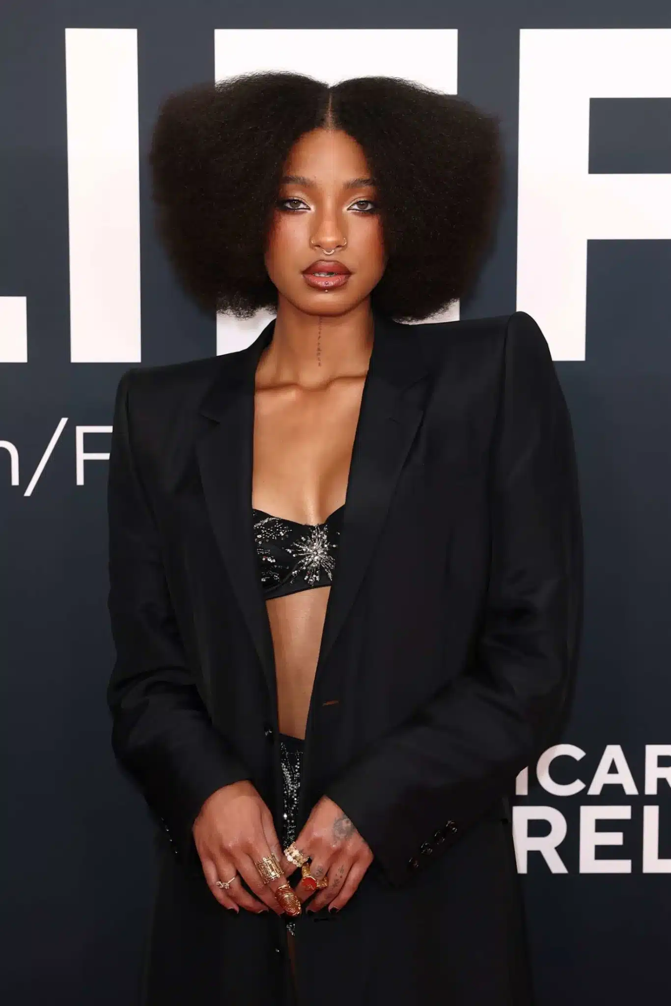 Willow Smith modeling a stacked lob in 35+ Polished Low-Maintenance Medium-Length Haircuts