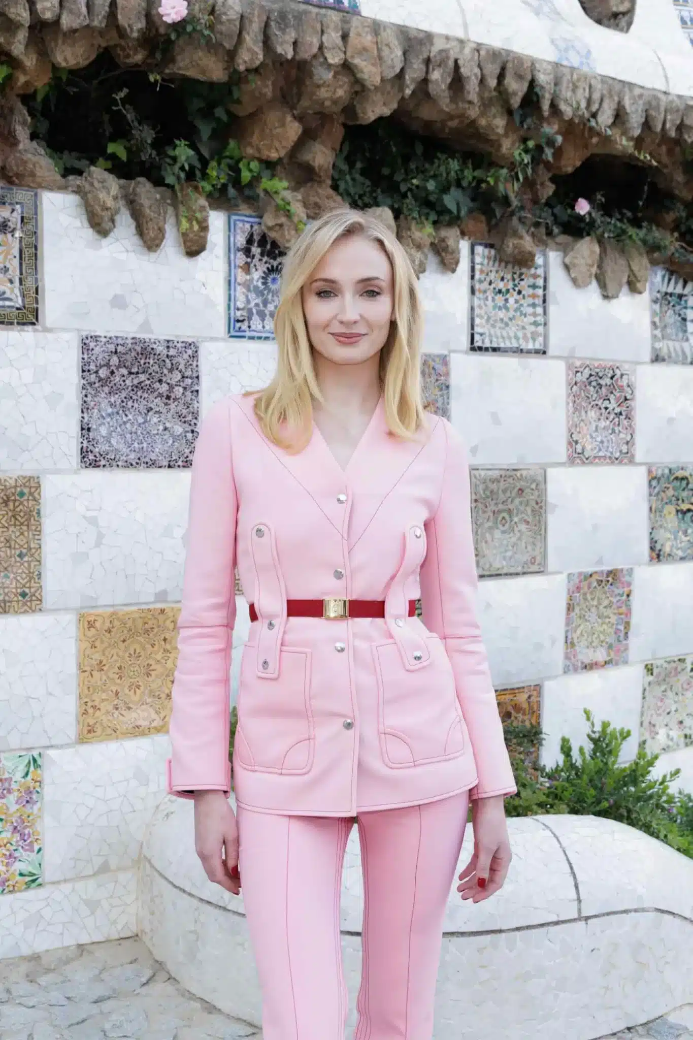 Sophie Turner wearing an airy layered lob featured in 35+ Polished Low-Maintenance Medium-Length Haircuts